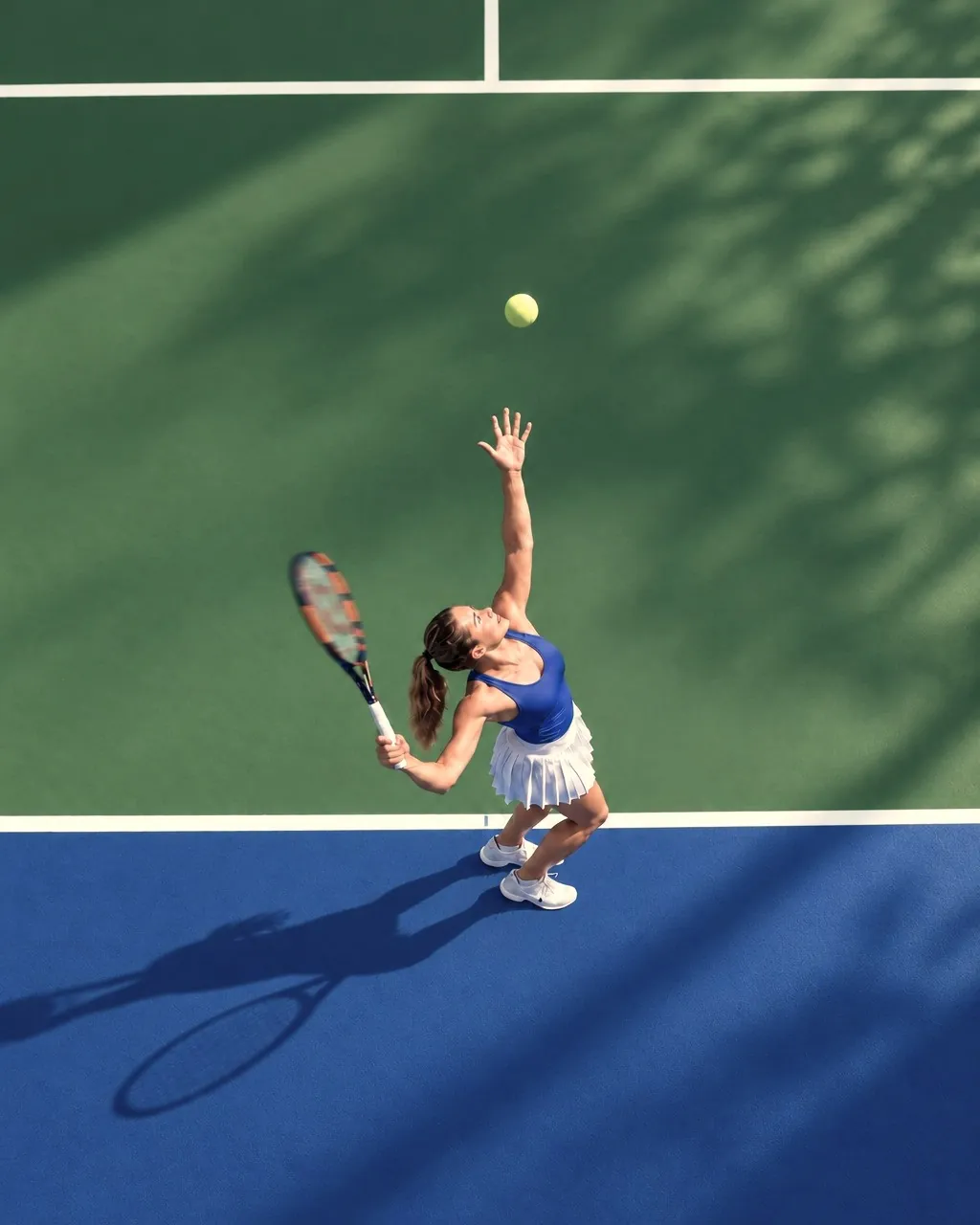A player tossing the ball to serve, seen from above on a sunlit court